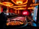 Experience exciting gambling action with 6FF, featuring roulette wheels and poker tables.