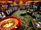 Players winning at tg88.com casino tables, enjoying roulette and slot machines in a vibrant atmosphere.
