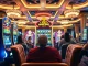 Experience the thrill of slot online gaming at a luxurious casino with vibrant machines.